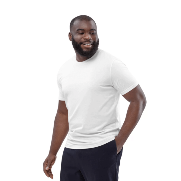 Smiling man in white t-shirt.