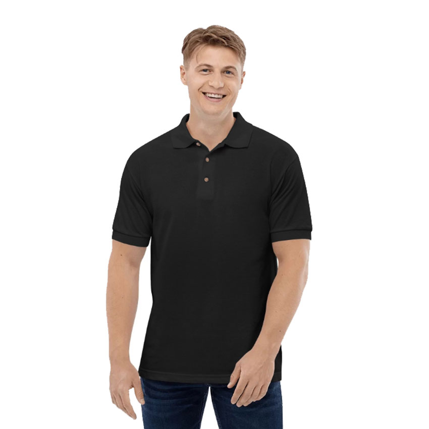 Man smiling in black polo shirt.